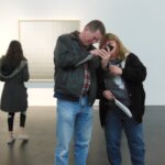 Checking out Paull's pics